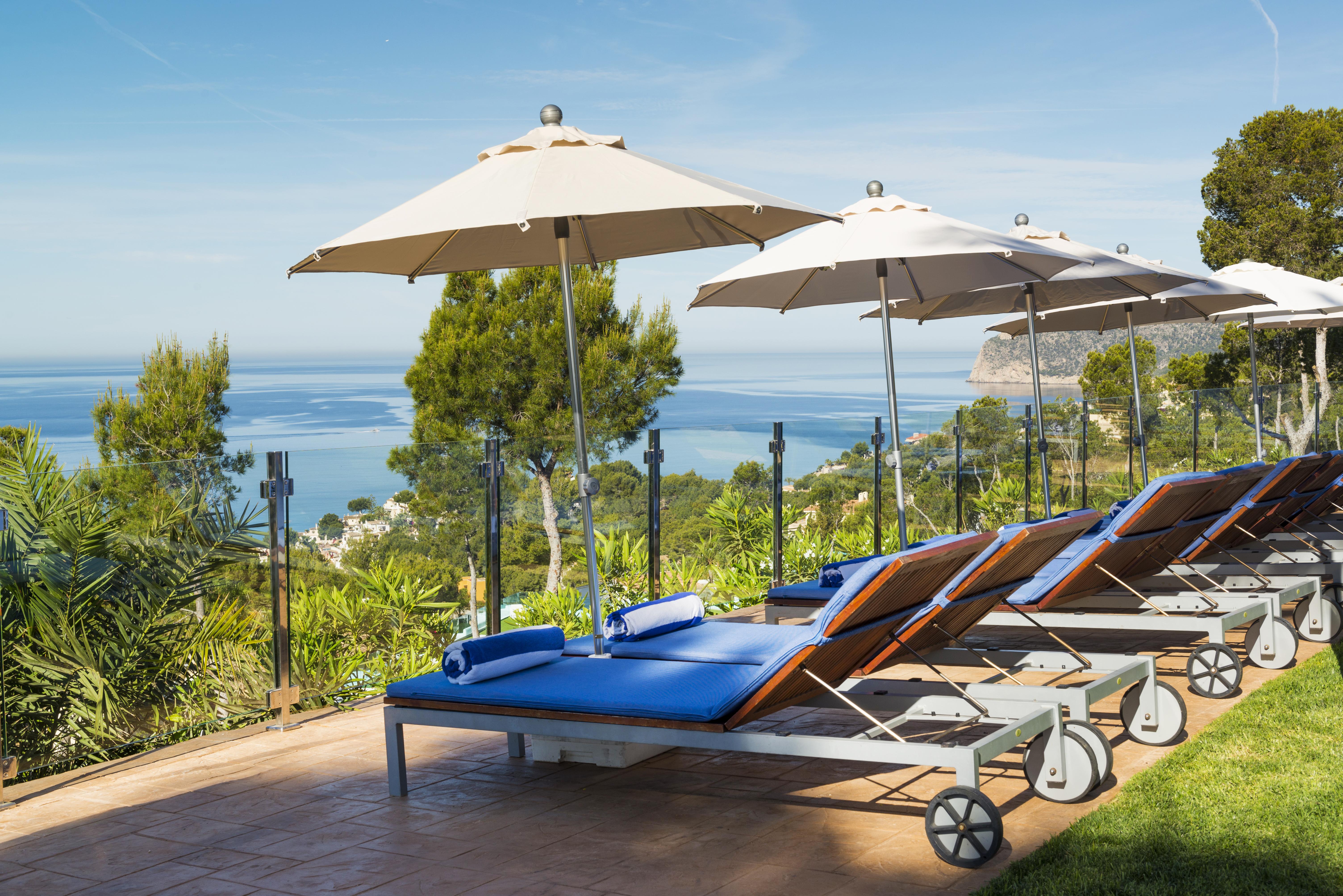 Hilton Mallorca Galatzo Peguera Exterior photo The resort's pool area